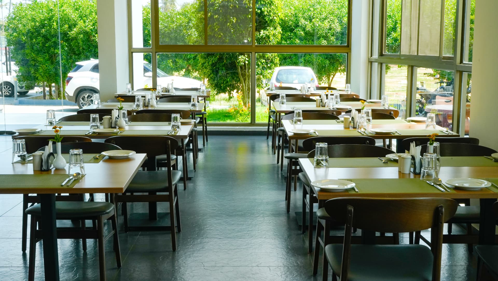 Meadows Cafe dining room at Hotel Four Meadows, Mysore